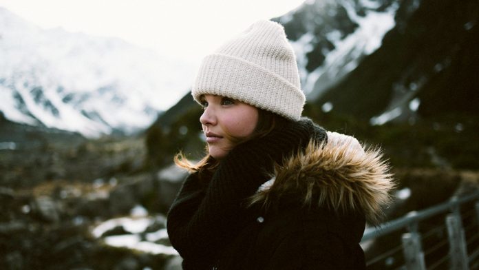 Woman looking on a winter scene