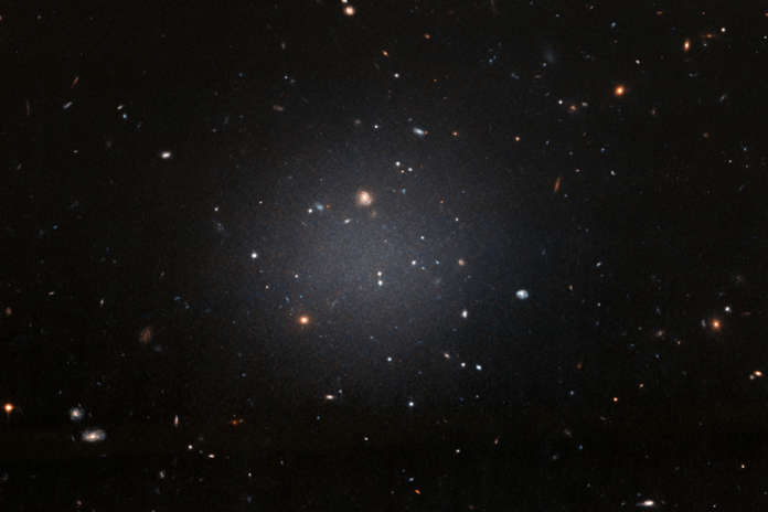 An image from the Hubble Space Telescope showing an unusual galaxy which does not appear to contain any dark matter.