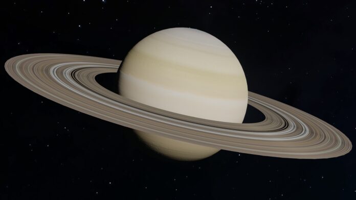 An image of Saturn. It is a pale yellow planet surrounded by a wide system of rings.