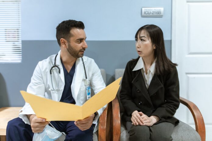 A doctor consulting with a patient.
